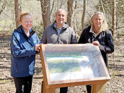Baxter Conservation Area Site Supervisor Andrea Wood, TD Bank Group’s Manager of Philanthropy Joshua Cayer and Rideau Valley Conservation Foundation’s Executive Director Diane Downey check out the new permanent Storybook Trail installed along one of Baxter’s most popular and accessible trails. 